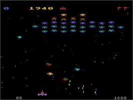 In game image of Galaxian on the Atari 8-bit.