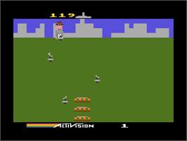 In game image of Kaboom on the Atari 8-bit.