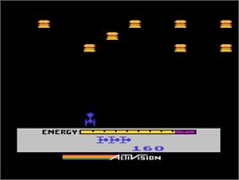 In game image of Megamania on the Atari 8-bit.