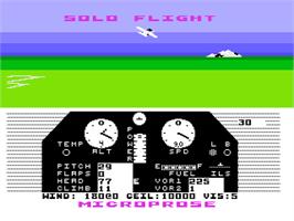 In game image of Solo Flight on the Atari 8-bit.