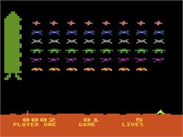 In game image of Space Invaders on the Atari 8-bit.