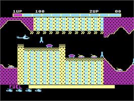 In game image of Super Cobra on the Atari 8-bit.
