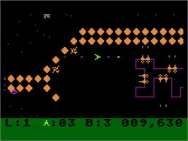 In game image of Survivor on the Atari 8-bit.