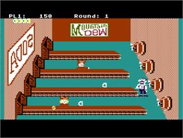 In game image of Tapper on the Atari 8-bit.