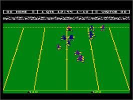 In game image of Touchdown Football on the Atari 8-bit.