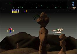 In game image of Defender 2000 on the Atari Jaguar.