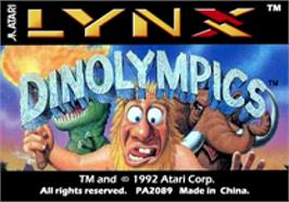 Top of cartridge artwork for Dinolympics on the Atari Lynx.