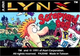 Top of cartridge artwork for Scrapyard Dog on the Atari Lynx.