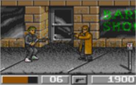 In game image of Dirty Larry: Renegade Cop on the Atari Lynx.