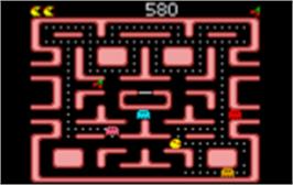 In game image of Ms. Pac-Man on the Atari Lynx.