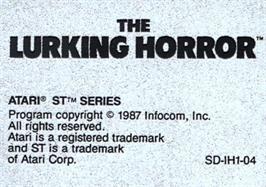 Top of cartridge artwork for Lurking Horror on the Atari ST.