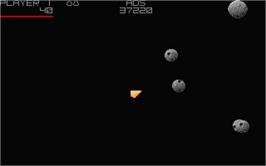 In game image of Asteroids Deluxe on the Atari ST.
