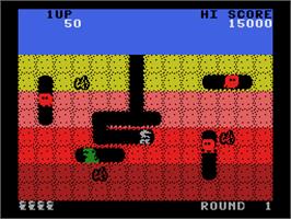 In game image of Dig Dug on the Coleco Vision.