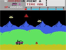 In game image of Moon Patrol on the Coleco Vision.