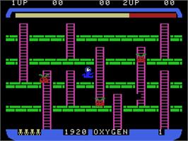 In game image of Space Panic on the Coleco Vision.