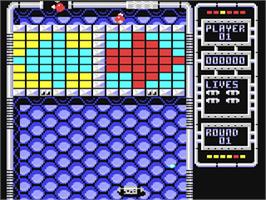In game image of Arkanoid 2: Revenge of Doh on the Commodore 64.