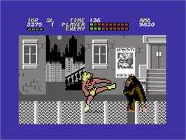 In game image of Bop'N Wrestle on the Commodore 64.