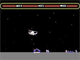 In game image of Choplifter! on the Commodore 64.