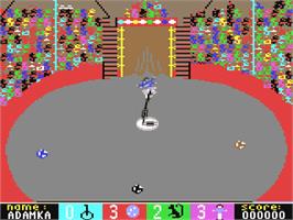 In game image of Circus Games on the Commodore 64.