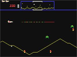 In game image of Defender on the Commodore 64.