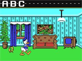In game image of Donald's Alphabet Chase on the Commodore 64.