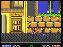 In game image of Double Dragon on the Commodore 64.