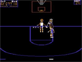 In game image of Dr. J and Larry Bird Go One on One on the Commodore 64.