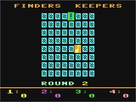 In game image of Finders Keepers on the Commodore 64.