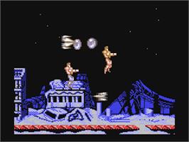 In game image of Forgotten Worlds on the Commodore 64.