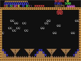 In game image of Galactic Attack on the Commodore 64.