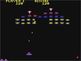 In game image of Galaxian on the Commodore 64.