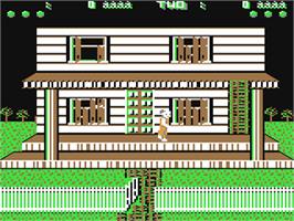 In game image of Ghost Chaser on the Commodore 64.