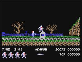 In game image of Ghosts'n Goblins on the Commodore 64.
