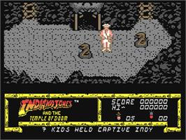 In game image of Indiana Jones and the Temple of Doom on the Commodore 64.