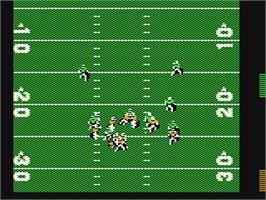 In game image of John Madden Football on the Commodore 64.