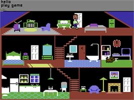 In game image of Little Computer People on the Commodore 64.