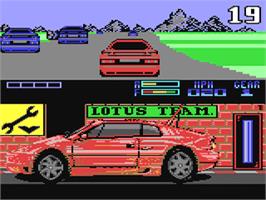 In game image of Lotus Esprit Turbo Challenge on the Commodore 64.