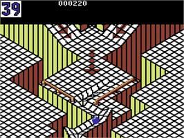 In game image of Marble Madness on the Commodore 64.