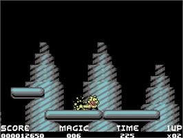 In game image of Mayhem in Monsterland on the Commodore 64.