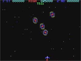 In game image of Moon Cresta on the Commodore 64.