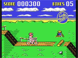 In game image of Motocross on the Commodore 64.