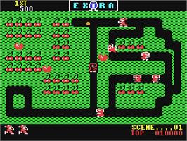 In game image of Mr. Do! on the Commodore 64.