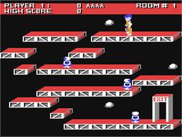 In game image of Ollie's Follies on the Commodore 64.