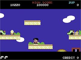 In game image of Rainbow Islands on the Commodore 64.