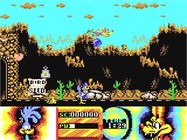 In game image of Road Runner and Wile E. Coyote on the Commodore 64.