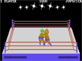 In game image of Rock'n Wrestle on the Commodore 64.