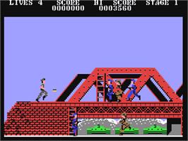 In game image of Rush'n Attack on the Commodore 64.