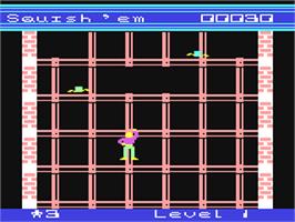 In game image of Squish 'Em on the Commodore 64.