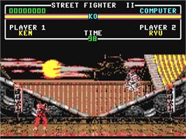 In game image of Street Fighter II on the Commodore 64.