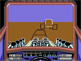 In game image of Stunt Car Racer on the Commodore 64.